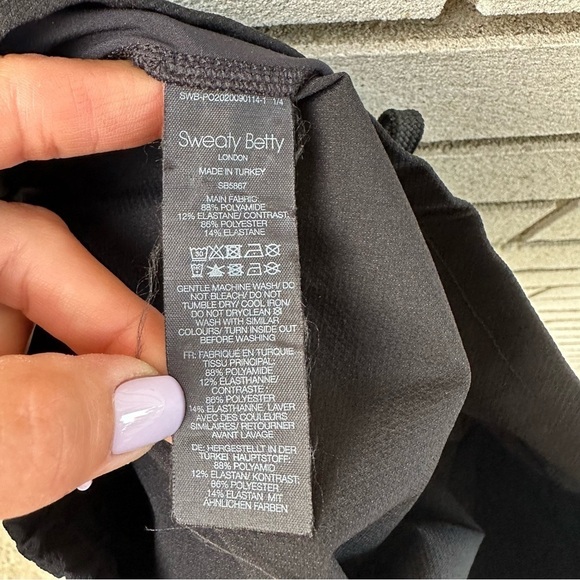 Sweaty Betty Black Trekker Hiking Pants L Utility Pockets Zipper Hem Athleisure - Picture 7 of 10